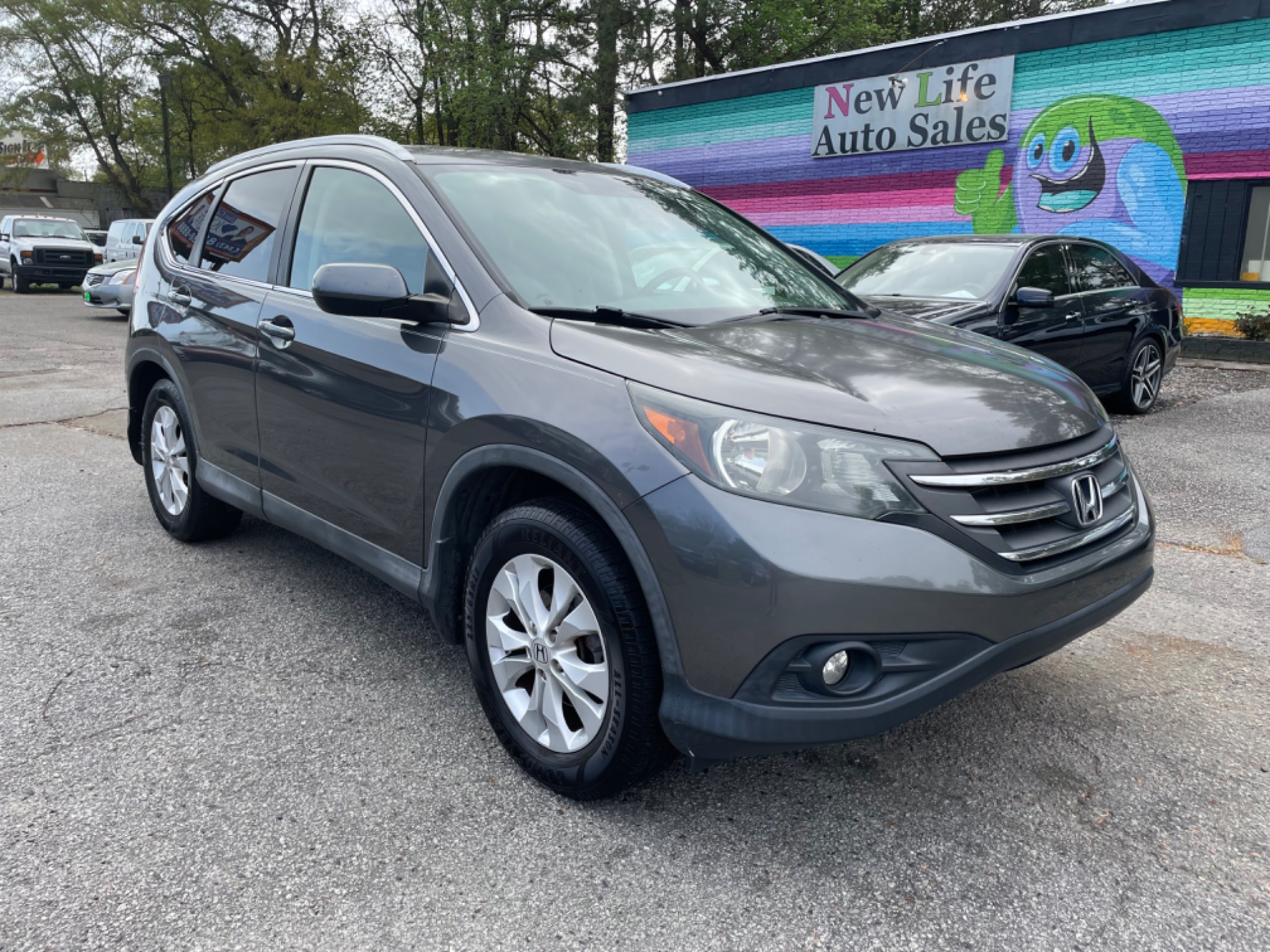 photo of 2014 HONDA CR-V EX-L - Spacious Cabin with Exceptional Cargo Space! Local Trade-in!!